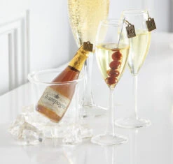 Raz Eric Cortina 4.25" Ice Bucket With Champagne Glass Christmas Ornament 4053111